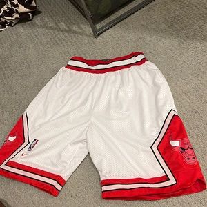 White and red Chicago bulls Nike swingman shorts. Never been worn. Orig $100